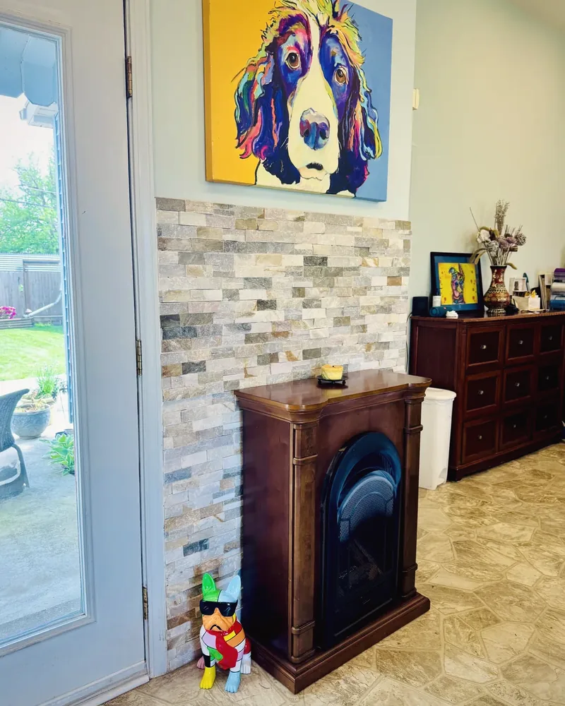 Stone accent wall and seating inside the Charleston, WV salon