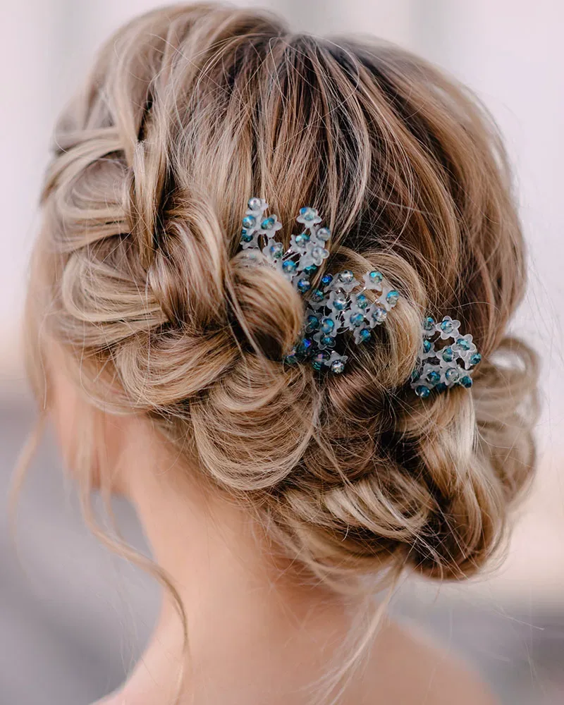 Bridal hairstyle close-up showing pinned curls