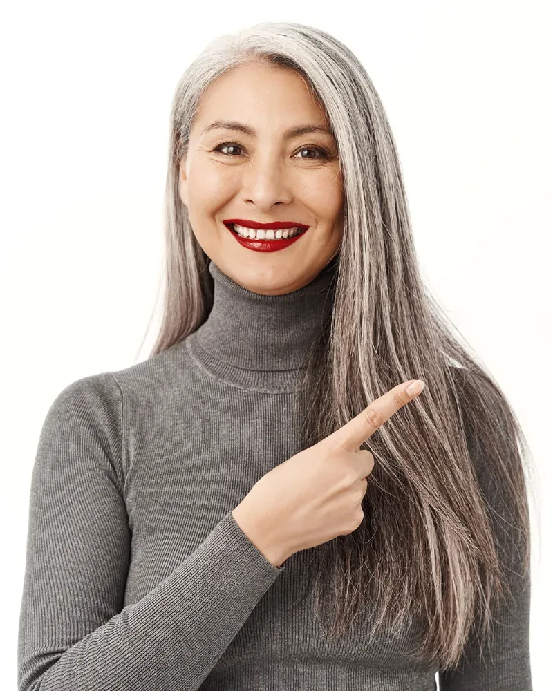 Client pointing toward the salon's address and directions