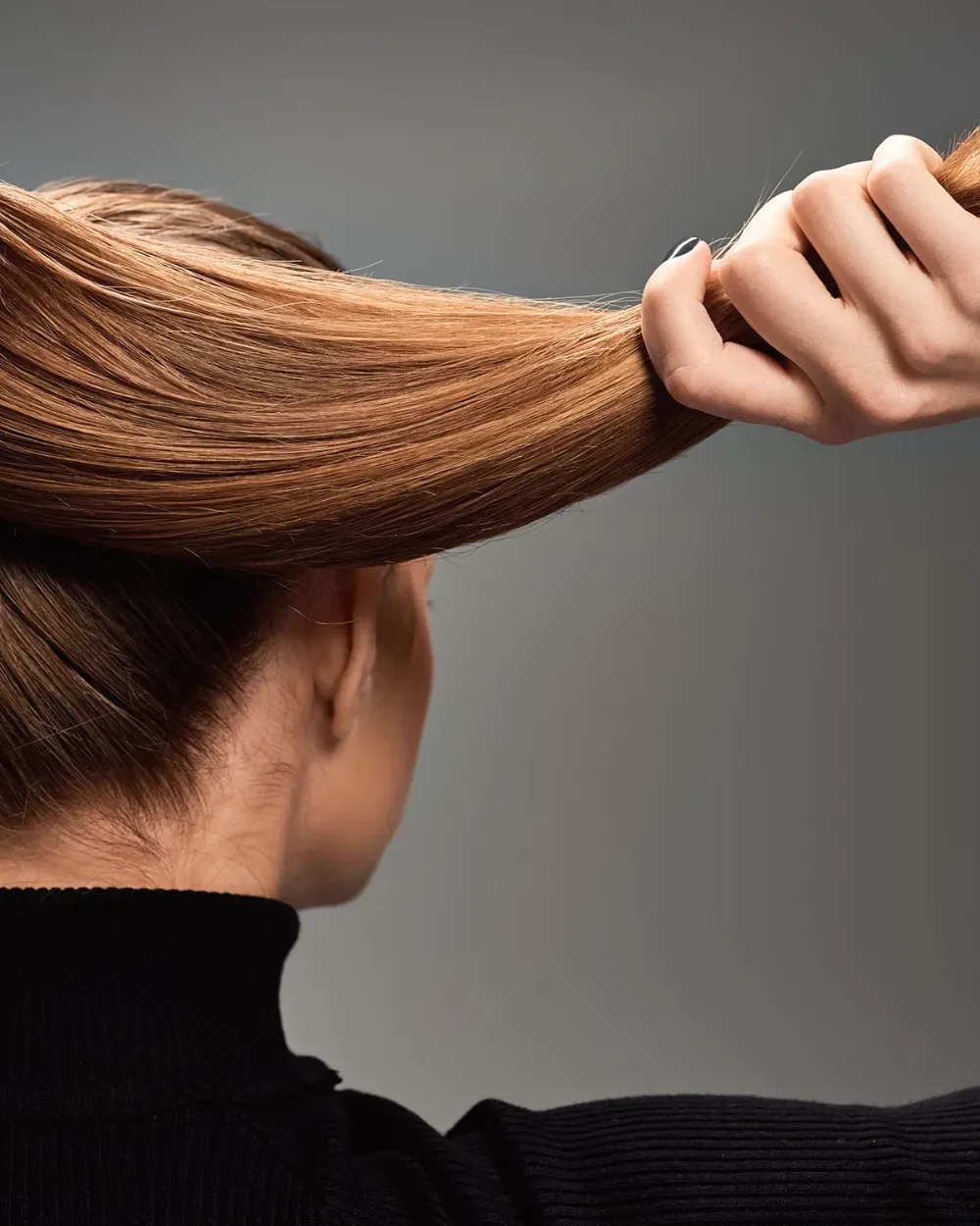 Smooth, glossy hair after a Brazilian Blowout smoothing treatment