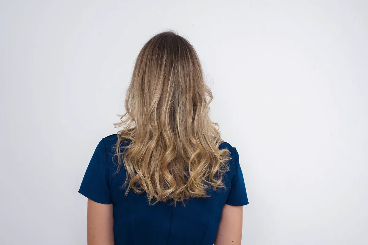 Soft, wavy hair after an American Wave service